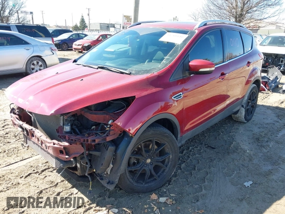 2016 Ford Escape Titanium with VIN 1FMCU9J98GUB42453, listed as a IAAI auction lot 41760110 with 116,452 mi miles. Bid and sale history available at carsss.com. Image 20.