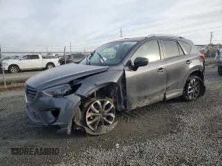 2016 Mazda CX-5 Grand Touring with VIN JM3KE4DY0G0876540, listed as a Copart auction lot 42132815 with 110,158 mi miles and Salvage Title. Bid and sale history available at carsss.com. Image 1.