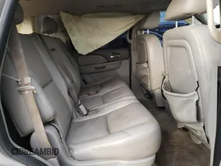 2009 Chevrolet Tahoe LTZ z VIN 1GNFC33039R211675, wystawiony jako Copart lot #81432314 z przebiegiem 189 499 mil mil oraz Szkoda całkowita • Salvage title. Historia ofert i sprzedaży dostępna na DreamBid. Obrazek 11.