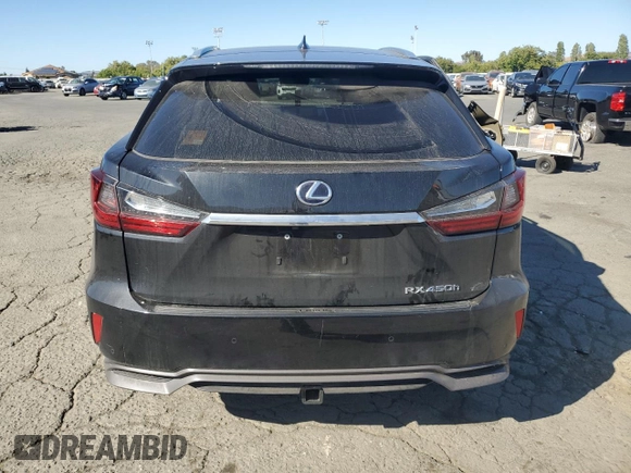 2019 Lexus RX 450h with VIN 2T2BGMCA4KC036097, listed as a Copart auction lot 61475175 with 63,811 mi miles and Salvage title. Bid and sale history available at DreamBid. Image 6.