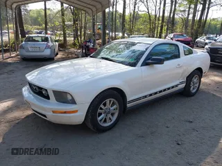 2008 Ford Mustang Deluxe with VIN 1ZVHT80N585151206, listed as a IAAI auction lot 42001372 with 199,207 mi miles and . Bid and sale history available at carsss.com. Image 2.