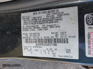 2010 Ford Fusion Hybrid with VIN 3FADP0L32AR371980, listed as a IAAI auction lot 42020330 with 272,984 mi miles. Bid and sale history available at carsss.com. Image 9.