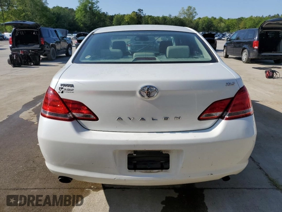 2007 Toyota Avalon XL z VIN 4T1BK36B87U251036, wystawiony jako Copart lot #52417095 z przebiegiem 218 502 mil mil oraz Szkoda całkowita • Salvage title. Historia ofert i sprzedaży dostępna na DreamBid. Obrazek 6.