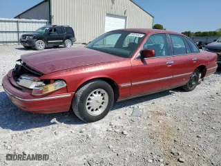 1997 Ford Crown Victoria LX with VIN 2FALP74W7VX148869, listed as a Copart auction lot 69004924 with 226,648 mi miles and Salvage Title. Bid and sale history available at carsss.com. Image 1.