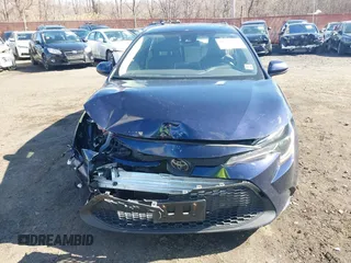 2021 Toyota Corolla LE with VIN JTDEPMAE7MJ150092, listed as a IAAI auction lot 41744119 with 82,203 mi miles and . Bid and sale history available at DreamBid. Image 13.
