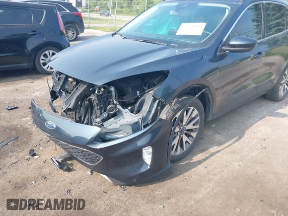 2022 Ford Escape Titanium with VIN 1FMCU9J93NUB50196, listed as a IAAI auction lot 42420209 with 22,210 mi miles and . Bid and sale history available at DreamBid. Image 6.