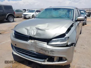 2014 Volkswagen Jetta SE with VIN 3VWD17AJ2EM314622, listed as a IAAI auction lot 42358394 with 105,654 mi miles and . Bid and sale history available at DreamBid. Image 6.