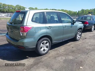 2017 Subaru Forester with VIN JF2SJAAC7HH490164, listed as a IAAI auction lot 42049411 with 143,312 mi miles. Bid and sale history available at carsss.com. Image 4.