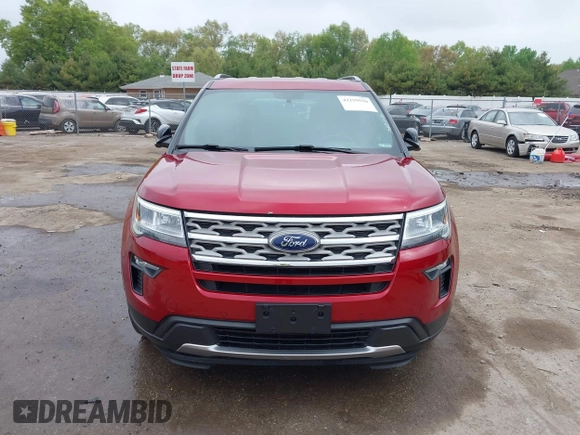 2018 Ford Explorer XLT z VIN 1FM5K8DH8JGA13677, wystawiony jako IAAI lot #42259550 z przebiegiem 71 257 mil mil oraz . Historia ofert i sprzedaży dostępna na DreamBid. Obrazek 12.