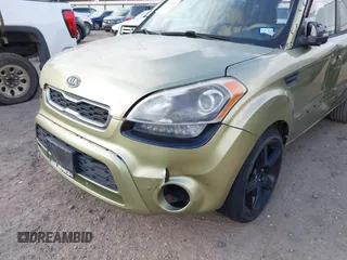 2012 Kia Soul + with VIN KNDJT2A69C7398380, listed as a IAAI auction lot 41523001 with 128,583 mi miles. Bid and sale history available at carsss.com. Image 12.
