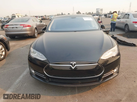 2013 Tesla Model S with VIN 5YJSA1CN3DFP06986, listed as a IAAI auction lot 41271801 with 150,307 mi miles and . Bid and sale history available at DreamBid. Image 12.