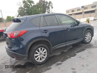 2016 Mazda CX-5 Sport с VIN JM3KE2BY2G0856071, выставлен на аукционе IAAI как лот 42473128 с пробегом 57 250 миль миль и . История ставок и продаж доступна на DreamBid. Изображение 4.