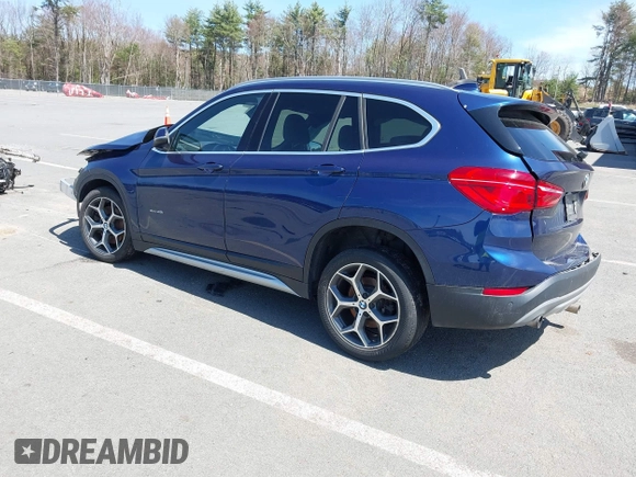 2017 BMW X1 xDrive28i with VIN WBXHT3C39H5F71525, listed as a IAAI auction lot 42050272 with 118,875 mi miles. Bid and sale history available at carsss.com. Image 3.