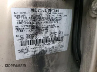 2007 Ford Five Hundred SEL with VIN 1FAHP24137G163701, listed as a Copart auction lot 60826555 with 169,948 mi miles and Salvage title. Bid and sale history available at DreamBid. Image 12.