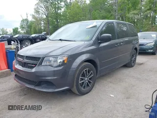 2015 Dodge Grand Caravan American Value with VIN 2C4RDGBG2FR542844, listed as a IAAI auction lot 42109983 with 129,718 mi miles and . Bid and sale history available at DreamBid. Image 2.