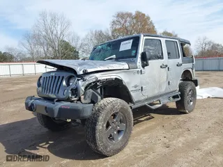 2015 Jeep Wrangler Unlimited Sport with VIN 1C4BJWDG0FL586710, listed as a IAAI auction lot 41468106 with 1 mi miles. Bid and sale history available at carsss.com. Image 17.