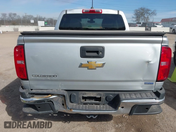 2019 Chevrolet Colorado 2WD Work Truck with VIN 1GCGSBEA7K1199177, listed as a IAAI auction lot 41622091 with 105,231 mi miles and . Bid and sale history available at DreamBid. Image 16.