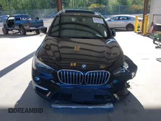 2018 BMW X1 xDrive28i z VIN WBXHT3C35J5L25056, wystawiony jako IAAI lot #42185474 z przebiegiem 62 631 mil mil oraz . Historia ofert i sprzedaży dostępna na DreamBid. Obrazek 12.