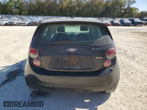 2014 Chevrolet Sonic LT with VIN 1G1JC6SB3E4195761, listed as a Copart auction lot 48679895 with 76,350 mi miles and Salvage Title. Bid and sale history available at carsss.com. Image 6.