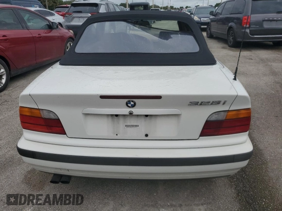 1997 BMW 3-Series 328IC with VIN WBABK8324VET95323, listed as a Copart auction lot 74764384 with 0 mi miles and Non Repairable. Bid and sale history available at carsss.com. Image 6.