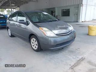 2007 Toyota Prius z VIN JTDKB20U373222820, wystawiony jako IAAI lot #42473629 z przebiegiem 119 189 mil mil oraz . Historia ofert i sprzedaży dostępna na DreamBid. Obrazek 1.