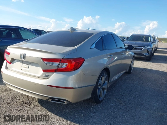 2020 Honda Accord Touring with VIN 1HGCV2F99LA029545, listed as a IAAI auction lot 40472177 with 44,960 mi miles and . Bid and sale history available at DreamBid. Image 4.