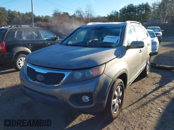 2012 Kia Sorento LX with VIN 5XYKT3A65CG240227, listed as a IAAI auction lot 41009682 with 276,573 mi miles. Bid and sale history available at carsss.com. Image 2.