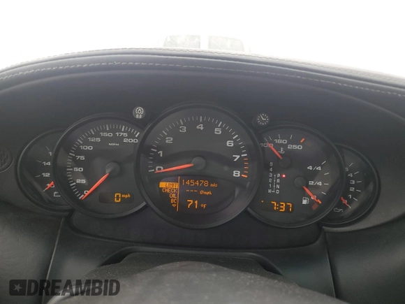 2004 Porsche 911 Carrera z VIN WP0AA29904S623031, wystawiony jako Copart lot #76551074 z przebiegiem 145 478 mil mil oraz Szkoda całkowita • Salvage title. Historia ofert i sprzedaży dostępna na DreamBid. Obrazek 9.
