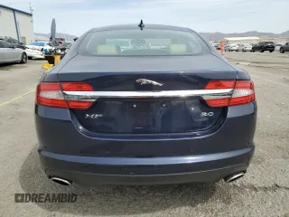 2014 Jaguar XF SC with VIN SAJWA0EX3E8U17748, listed as a Copart auction lot 52010435 with 84,685 mi miles and Salvage Title. Bid and sale history available at DreamBid. Image 6.