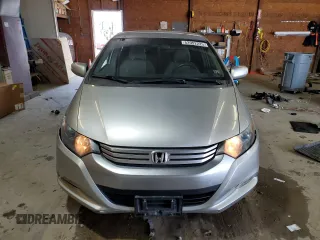2010 Honda Insight EX with VIN JHMZE2H76AS021610, listed as a Copart auction lot 62992225 with 162,974 mi miles and Salvage title. Bid and sale history available at DreamBid. Image 5.