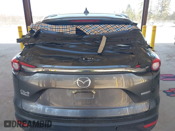 2021 Mazda CX-9 Signature with VIN JM3TCBEY9M0504963, listed as a IAAI auction lot 41756255 with 49,946 mi miles. Bid and sale history available at carsss.com. Image 6.