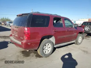 2007 GMC Yukon SLT with VIN 1GKFK13037J101824, listed as a Copart auction lot 77865294 with 179,884 mi miles and Salvage Title. Bid and sale history available at carsss.com. Image 3.