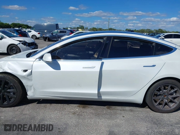 2020 Tesla Model 3 Standard Range Plus with VIN 5YJ3E1EA8LF783631, listed as a IAAI auction lot 40696383 with 78,889 mi miles. Bid and sale history available at carsss.com. Image 13.
