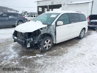 2011 Dodge Grand Caravan Mainstreet with VIN 2D4RN3DG7BR690603, listed as a IAAI auction lot 41271656 with 131,851 mi miles. Bid and sale history available at carsss.com. Image 2.