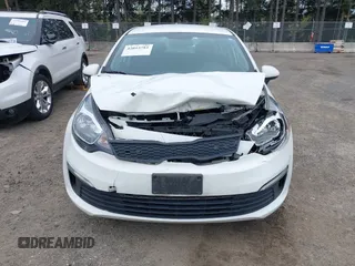 2016 Kia Rio LX with VIN KNADM4A36G6686149, listed as a IAAI auction lot 42015781 with 104,582 mi miles. Bid and sale history available at carsss.com. Image 12.