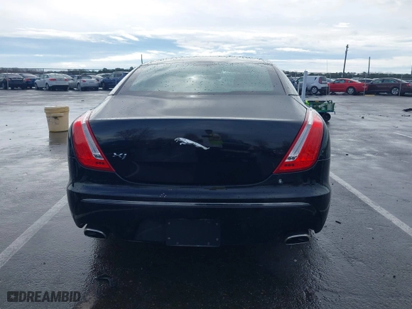 2011 Jaguar XJ with VIN SAJWA1CB8BLV12389, listed as a IAAI auction lot 41957217 with 51,585 mi miles. Bid and sale history available at carsss.com. Image 16.