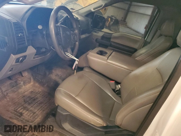 2018 Ford F-150 XL with VIN 1FTMF1CB2JFE39024, listed as a Copart auction lot 88847245 with 121,592 mi miles and Salvage Title. Bid and sale history available at carsss.com. Image 7.