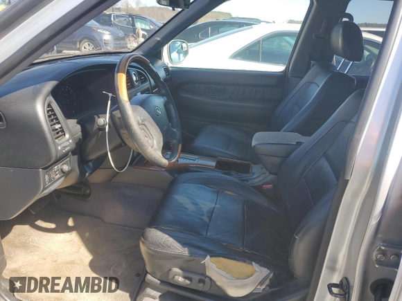 2003 Infiniti QX4 with VIN JNRDR09X13W250162, listed as a Copart auction lot 49415115 with 264,745 mi miles and Clean Title. Bid and sale history available at DreamBid. Image 7.