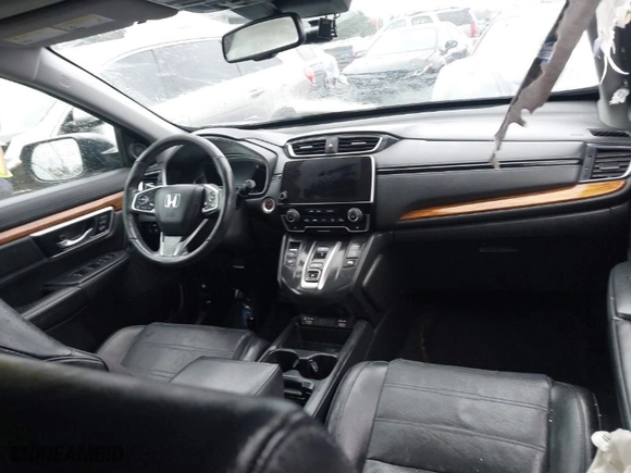 2020 Honda CR-V Hybrid EX-L with VIN 7FART6H8XLE011609, listed as a IAAI auction lot 41573897 with 95,966 mi miles. Bid and sale history available at carsss.com. Image 5.