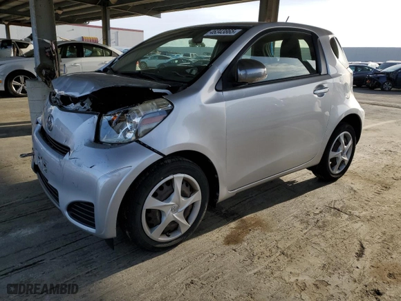 2015 Scion iQ with VIN JTNJJXB01FJ030680, listed as a Copart auction lot 46949235 with 27,509 mi miles and Salvage Title. Bid and sale history available at carsss.com. Image 1.
