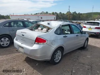 2009 Ford Focus SE with VIN 1FAHP35N49W148334, listed as a IAAI auction lot 41887678 with 73,630 mi miles. Bid and sale history available at carsss.com. Image 6.