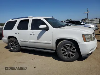 2007 Chevrolet Tahoe LTZ with VIN 1GNFC13J47R182259, listed as a Copart auction lot 57441205 with 204,898 mi miles and Salvage title. Bid and sale history available at DreamBid. Image 4.