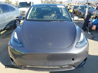 2022 Tesla Model Y Performance with VIN 7SAYGDEF7NF562895, listed as a IAAI auction lot 41692864 with 29,904 mi miles and . Bid and sale history available at DreamBid. Image 11.