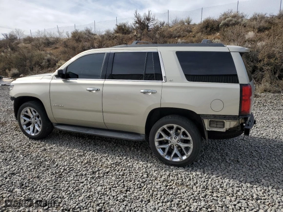 2015 Chevrolet Tahoe LT with VIN 1GNSKBKC6FR162216, listed as a Copart auction lot 48340265 with 125,851 mi miles and Salvage Title. Bid and sale history available at carsss.com. Image 2.