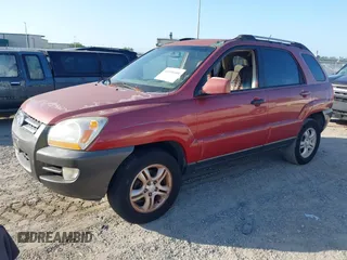 2005 Kia Sportage LX with VIN KNDJF723457078461, listed as a IAAI auction lot 41948080 with 104,330 mi miles and . Bid and sale history available at carsss.com. Image 2.