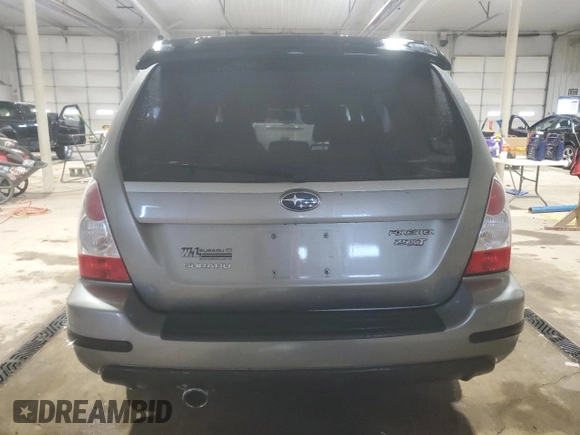 2007 Subaru Forester Sports XT with VIN JF1SG696X7H725959, listed as a Copart auction lot 86597334 with 56,997 mi miles and Salvage Title. Bid and sale history available at carsss.com. Image 6.