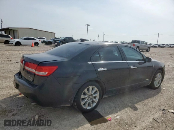 2011 Lincoln MKZ Hybrid z VIN 3LNDL2L34BR774759, wystawiony jako Copart lot #56934455 z przebiegiem 80 424 mil mil oraz Szkoda całkowita • Salvage title. Historia ofert i sprzedaży dostępna na DreamBid. Obrazek 3.