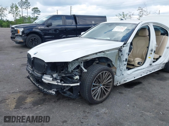 2018 BMW 5 Series 530i with VIN WBAJA5C55JWA38747, listed as a IAAI auction lot 41922937 with 100,951 mi miles and . Bid and sale history available at DreamBid. Image 6.