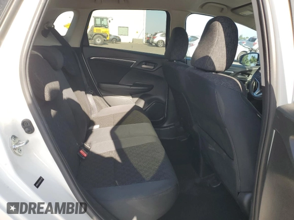 2016 Honda Fit LX z VIN JHMGK5H57GX045796, wystawiony jako Copart lot #59555545 z przebiegiem 94 235 mil mil oraz Szkoda całkowita • Salvage title. Historia ofert i sprzedaży dostępna na DreamBid. Obrazek 10.
