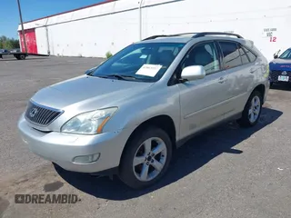 2006 Lexus RX 330 with VIN 2T2GA31U16C045926, listed as a IAAI auction lot 42063557 with 208,334 mi miles. Bid and sale history available at carsss.com. Image 2.